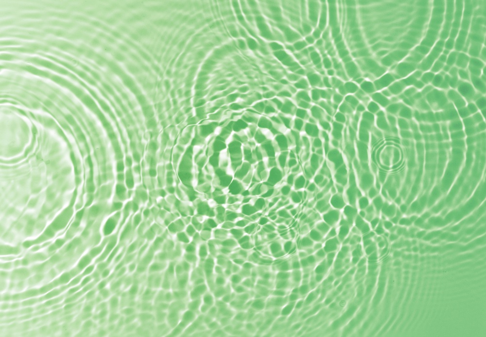 green water background ripples